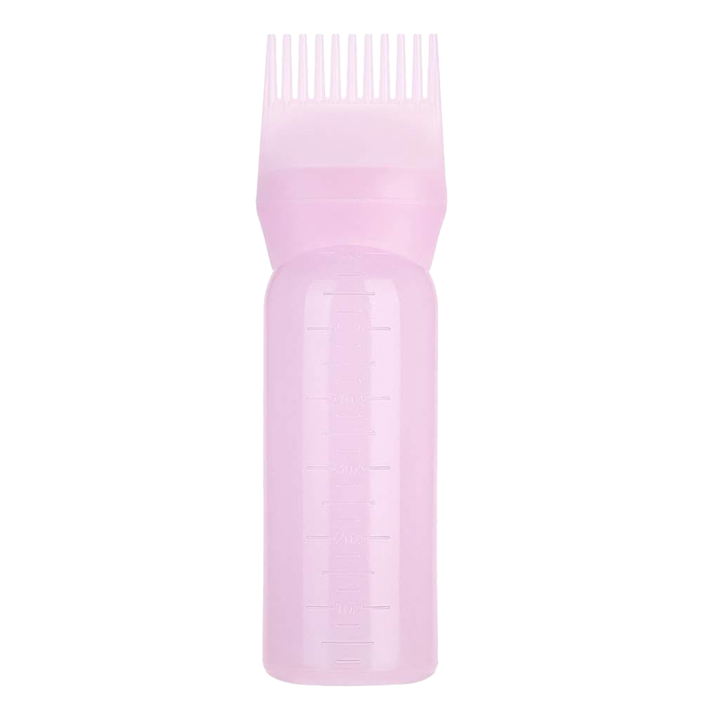 bouteille avec peigne à huile pour cheveux